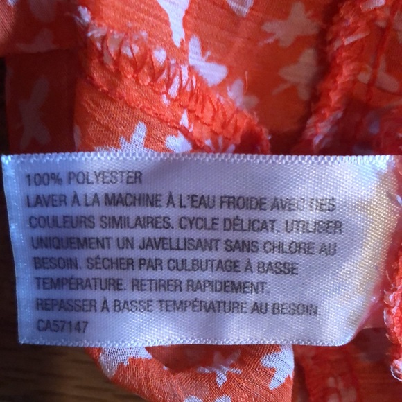 Sleeveless butterfly button down with high-low cut - Picture 5 of 5